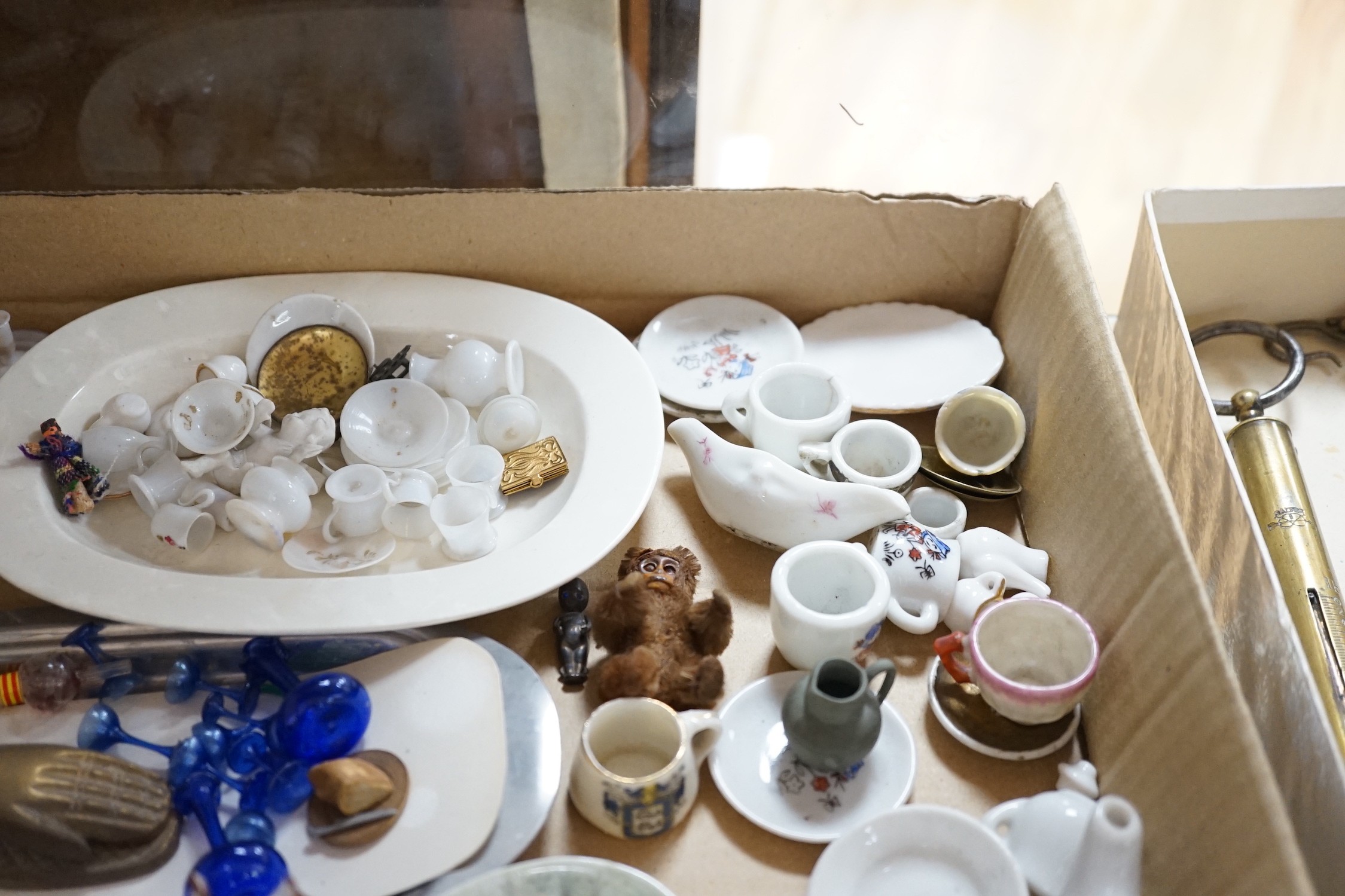 A collection of mixed odd dolls house ceramics including a miniature toy monkey, possibly Schuco